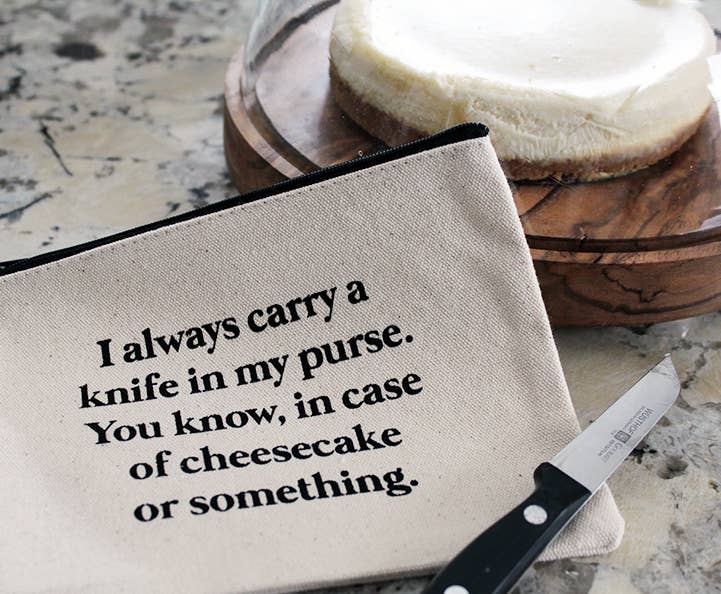 I always carry a  Knife In Purse cheesecake Zipper Pouch